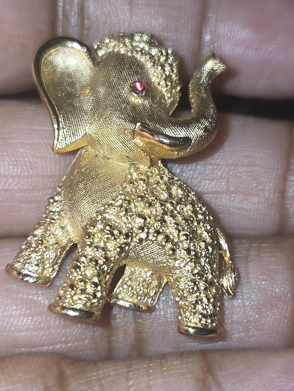 Vintage CROWN TRIFARI Gold Tone Red Eye Rhinestone Elephant Pin Brooch